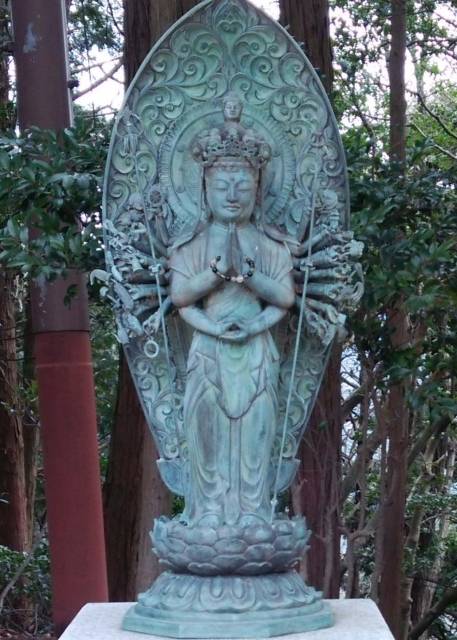 Eleven-faced thousand-armed Avalokitesvara Bodhisattva.