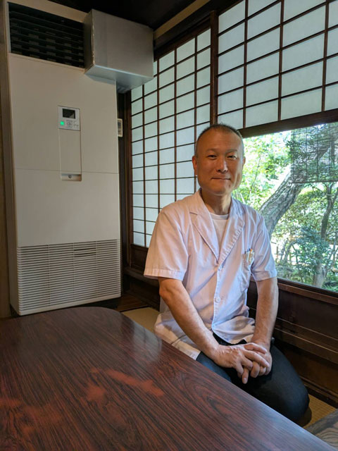 店のご主人の写真